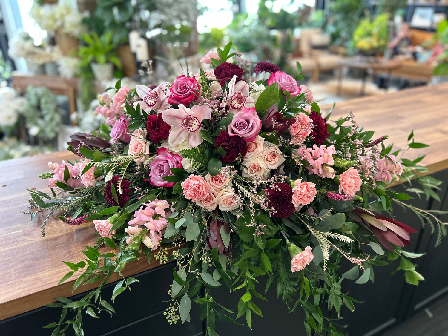 Pinks, burgundy and Rose Casket Spray