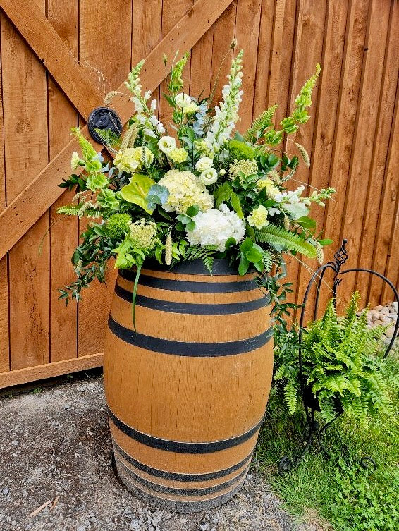 Wedding: Whiskey Barrel Arrangements for the Ceremony