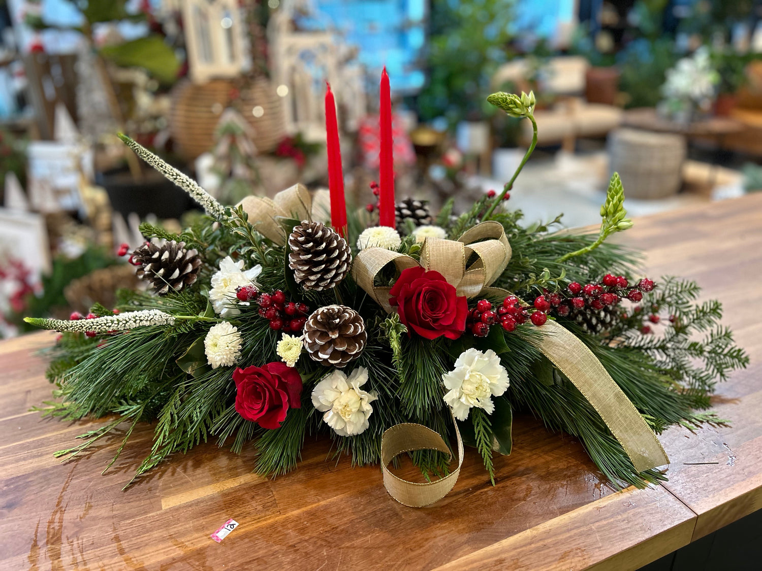 Elegant Fresh Centrepiece with Candles in Red