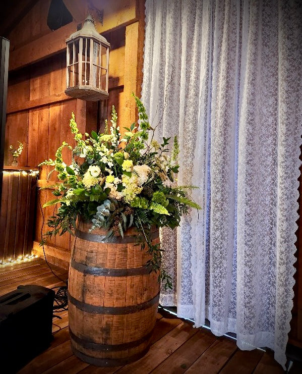 Wedding: Whiskey Barrel Arrangements for the Ceremony