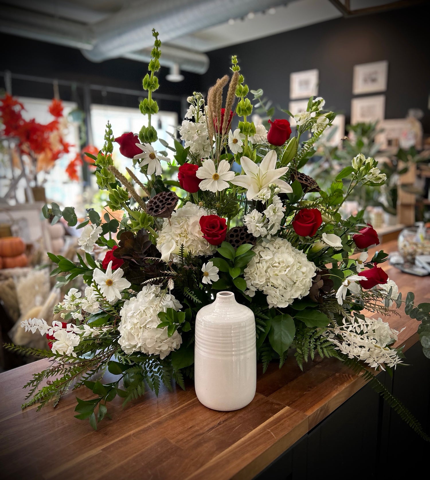White and Red Urn Backing Arrangement