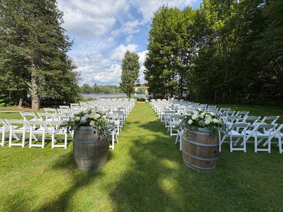 Wedding: Whiskey Barrel Arrangements for the Ceremony