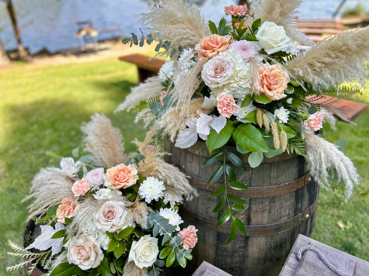 Wedding: Whiskey Barrel Arrangements for the Ceremony