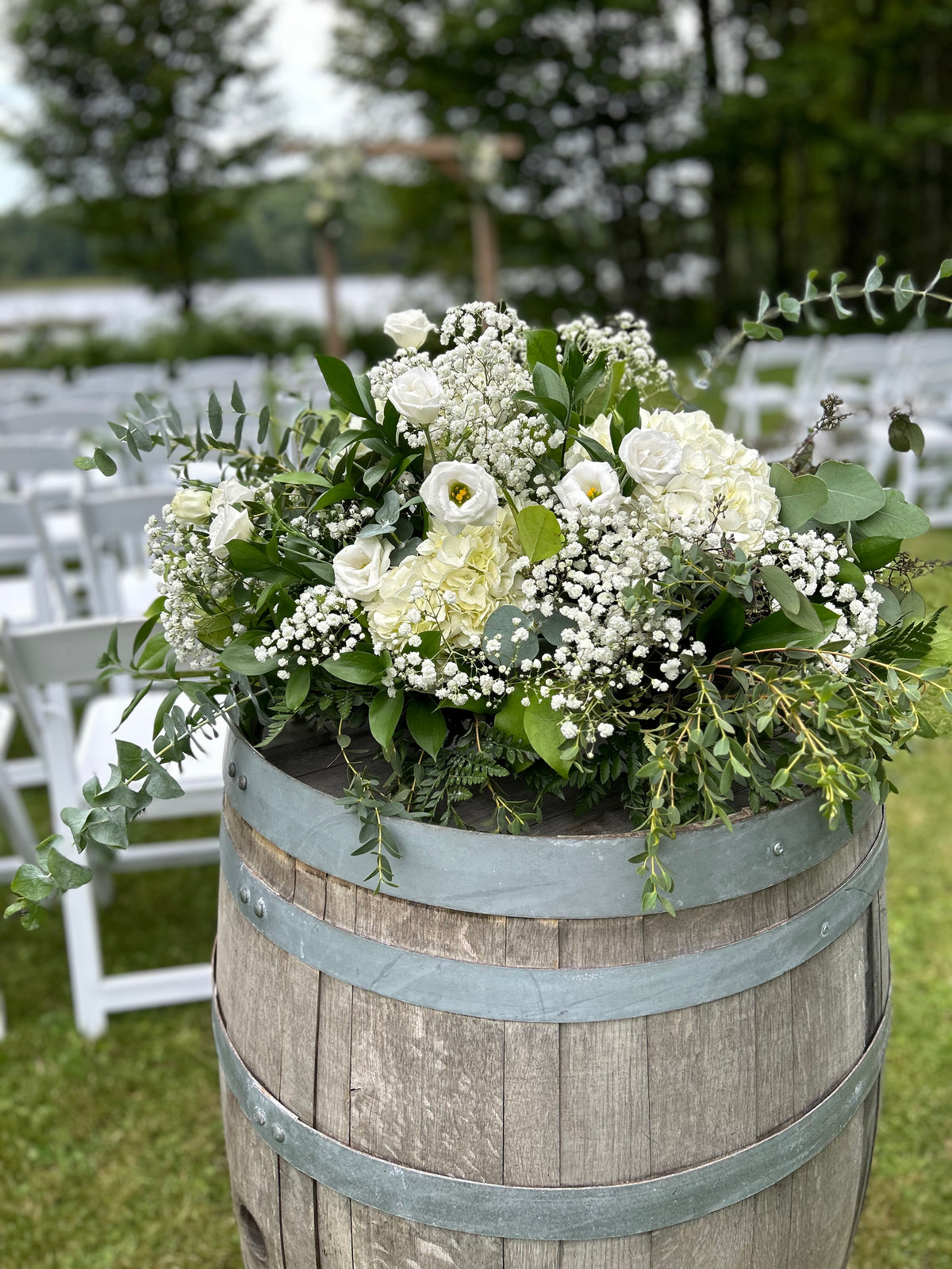 Wedding: Whiskey Barrel Arrangements for the Ceremony