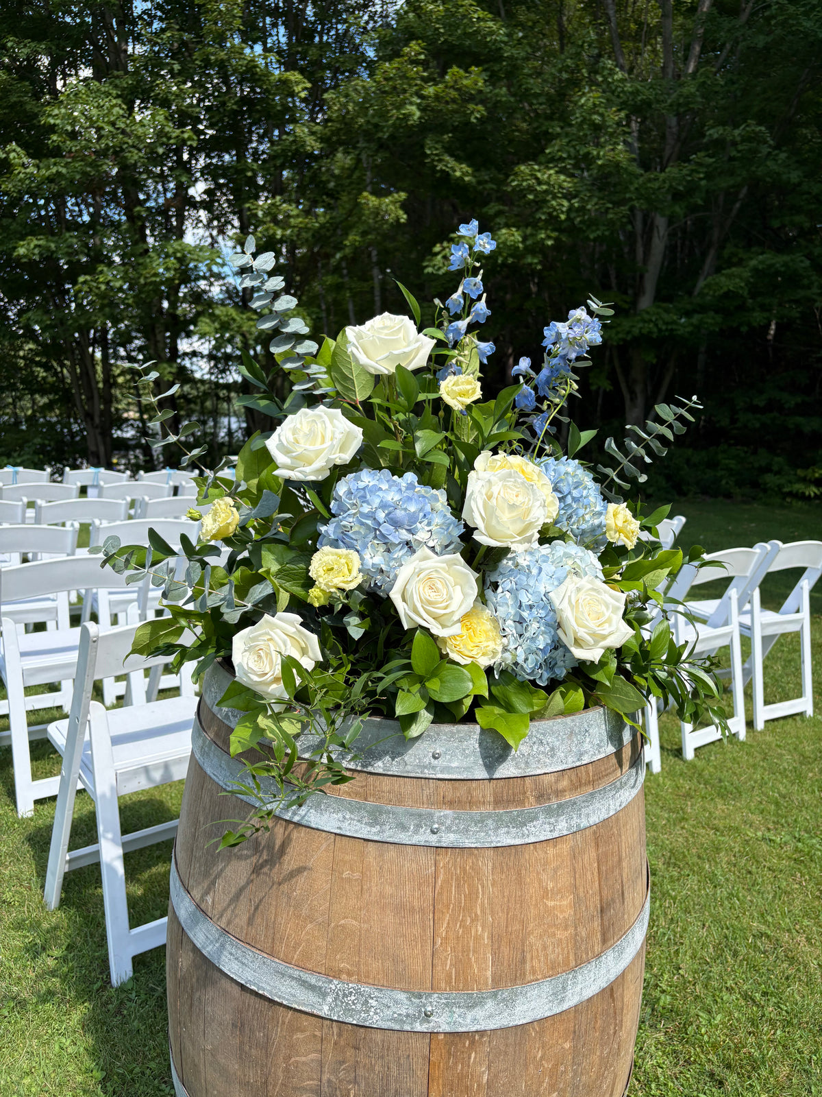 Wedding: Whiskey Barrel Arrangements for the Ceremony