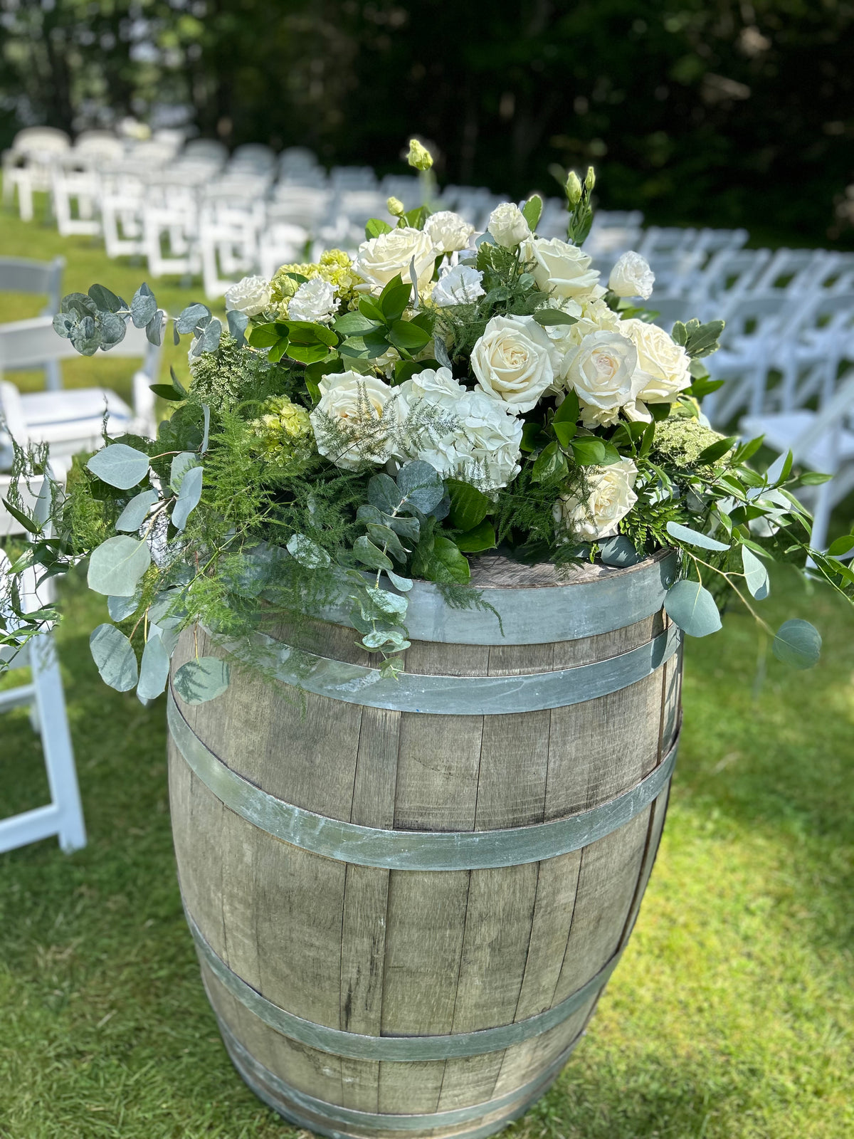 Wedding: Whiskey Barrel Arrangements for the Ceremony