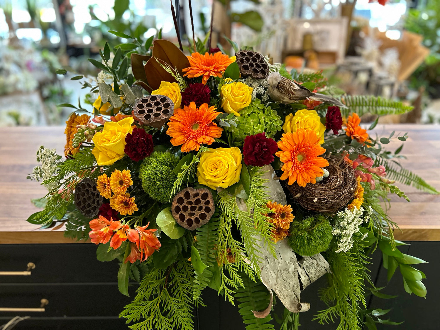 Warm Fall Shades Casket Spray