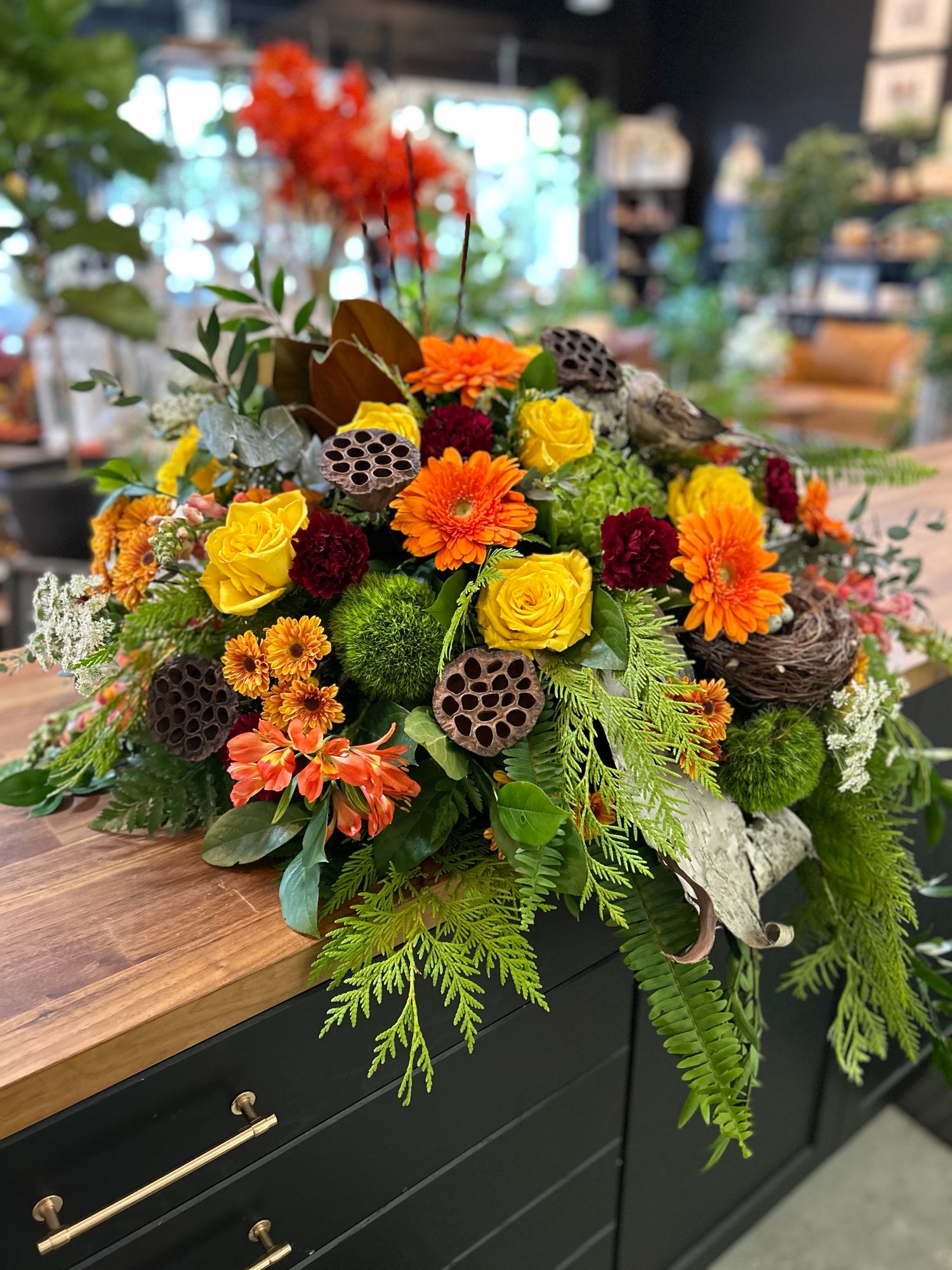 Warm Fall Shades Casket Spray