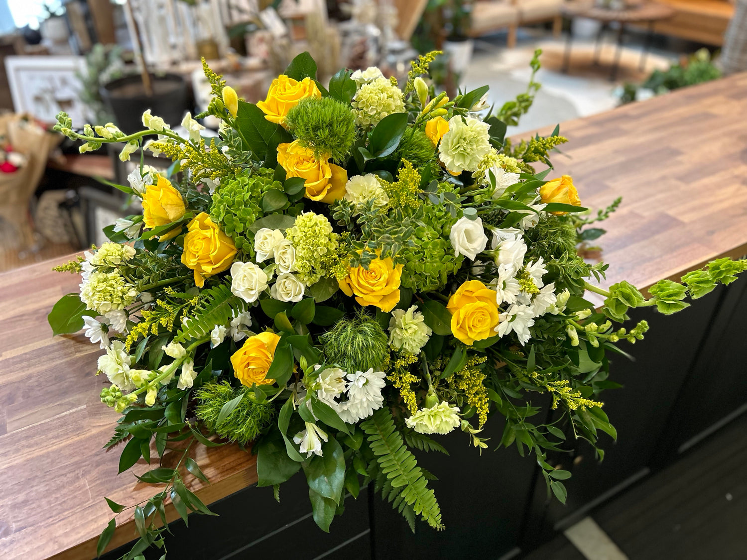 Yellow, White and Green Casket Spray