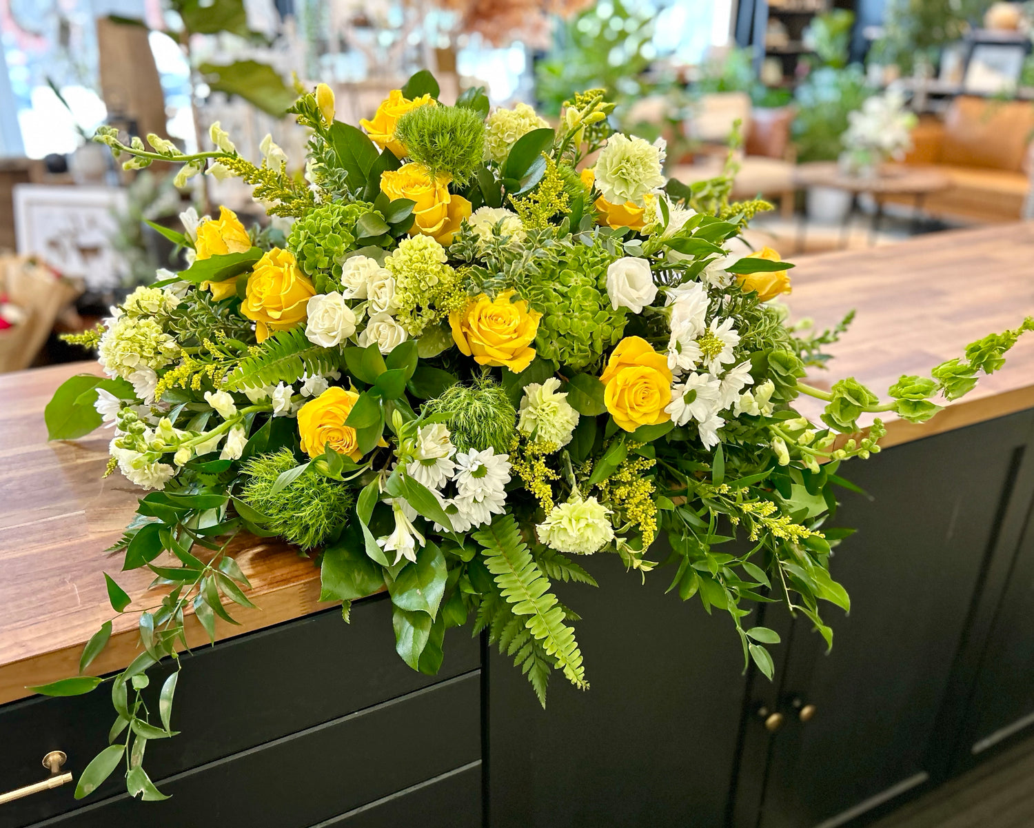 Yellow, White and Green Casket Spray